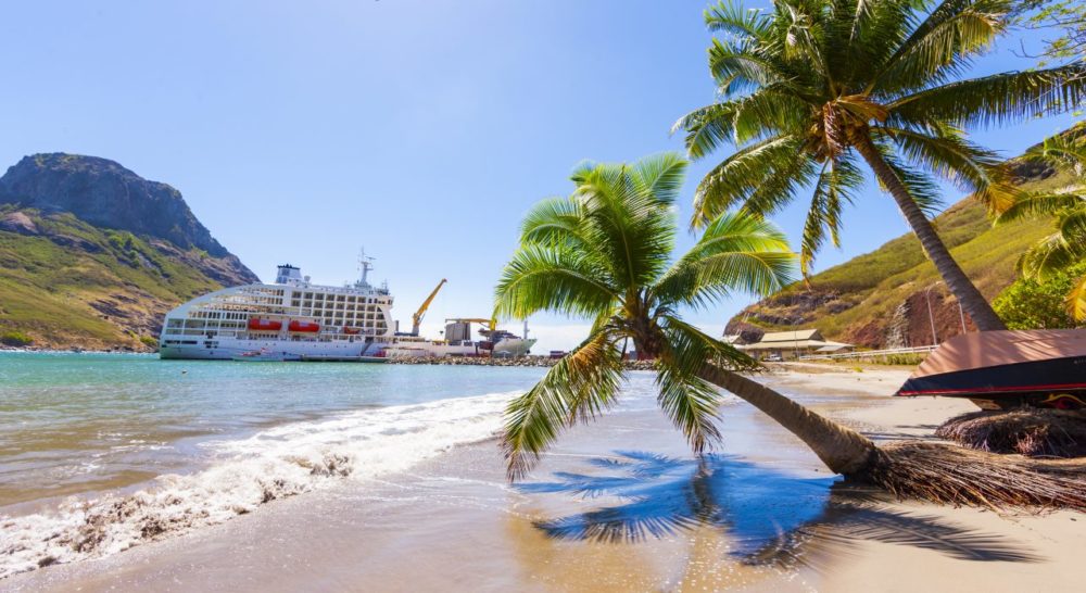 overview of aranui 5 ship and palm trees